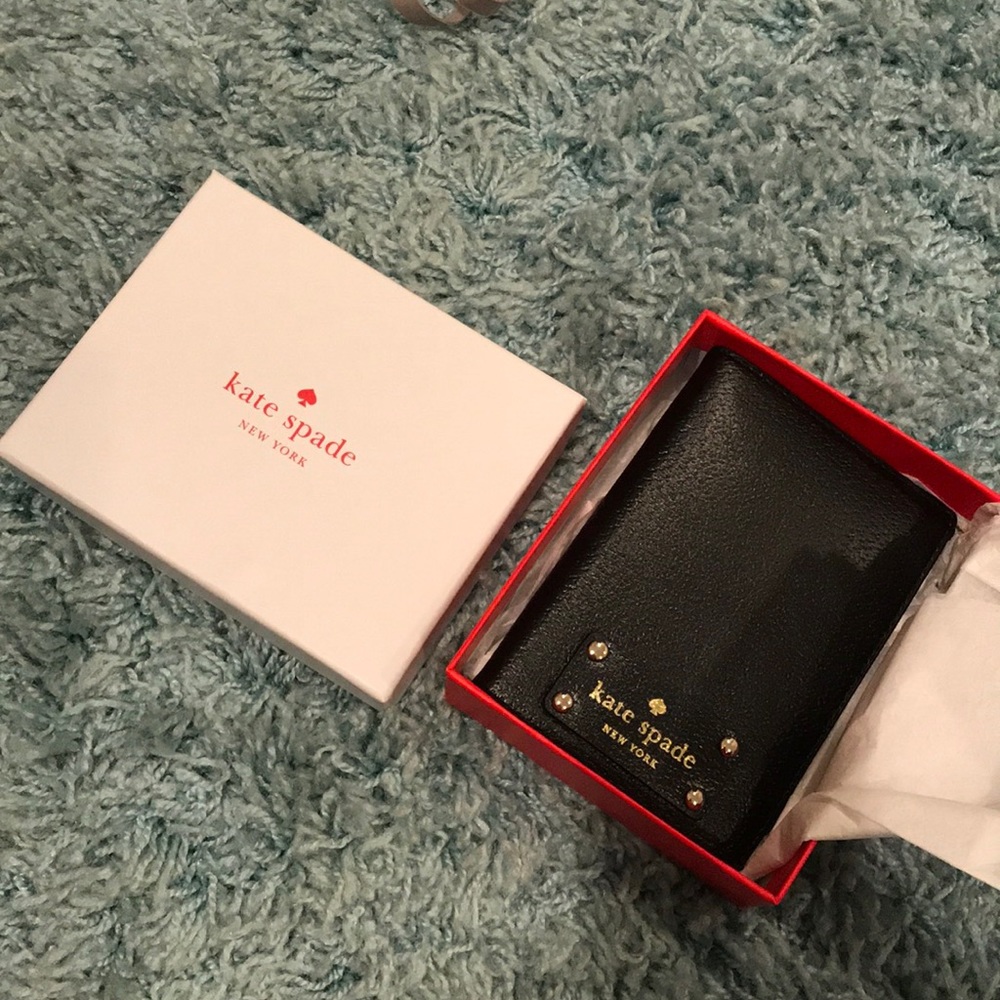 Passport case I believe. Received as a gift.